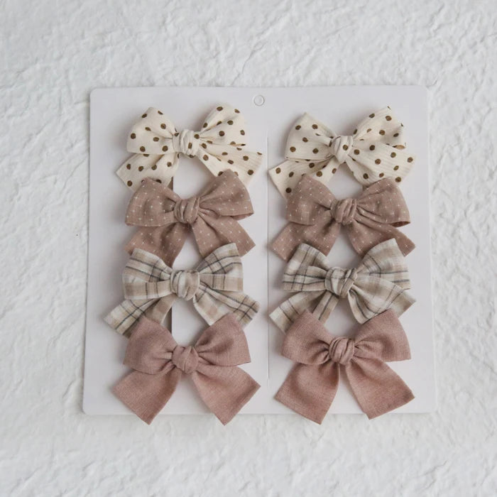 Élégants nœuds en tissu pour cheveux, clips modernes et adorables pour enfants. Ces accessoires couvrent bien les cheveux et sont confectionnés en tissu doux et tendance.